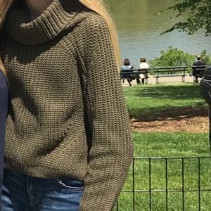 Chunky neck cable knit sweater